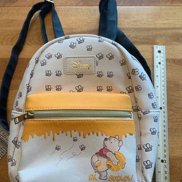 Disney Loungefly mini. Pooh bear. New without tags. Never used